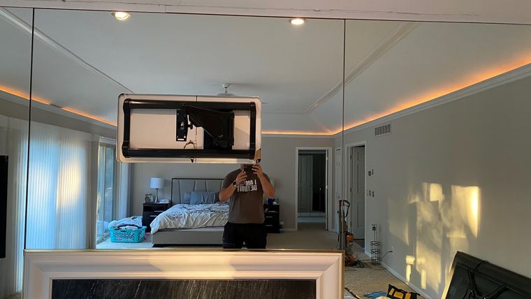 Mirrored bedroom wall