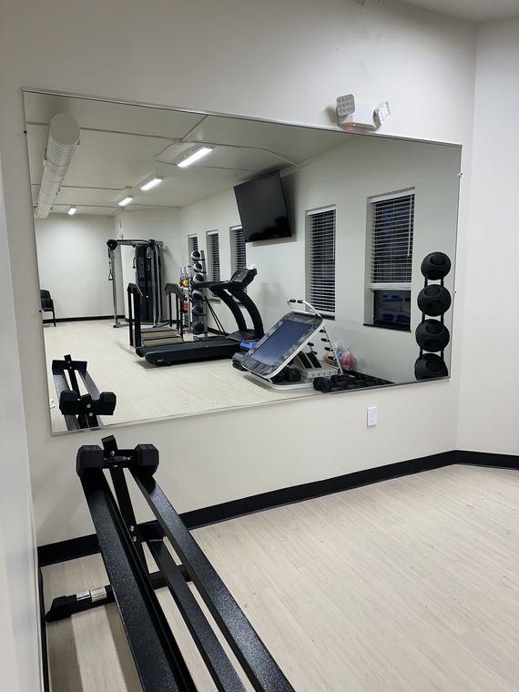 Mirror wall in a basement gym