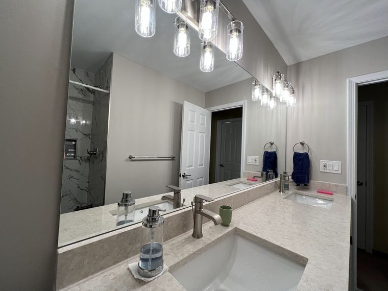 Wide vanity mirror with polished edges