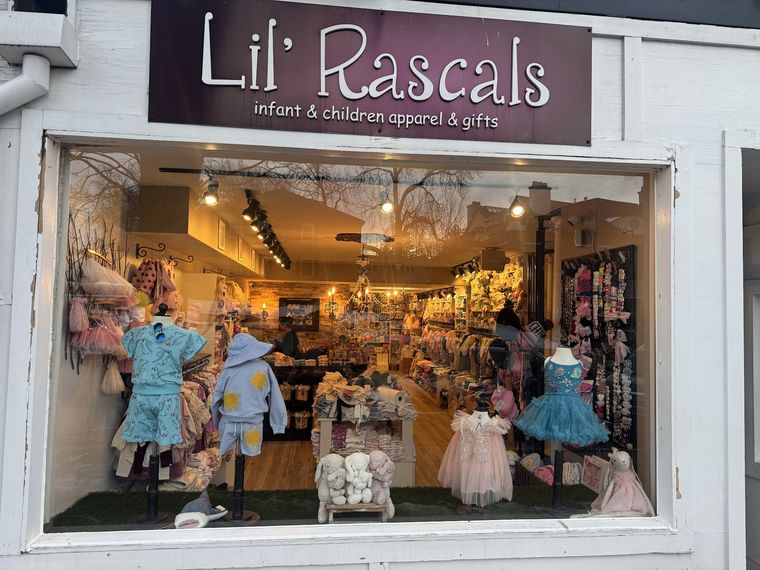 Replaced retail storefront glass at a children's clothing shop