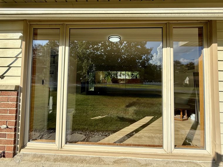 New clear picture window glass installed in a home