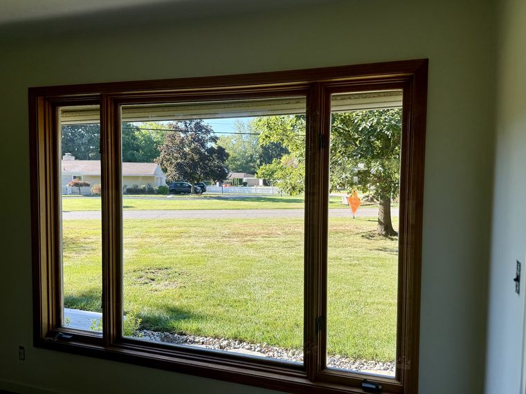 Picture window glass in stained trim